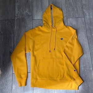 Yellow champion hoodie.